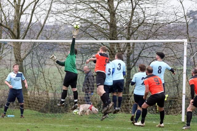 Goalmouth action in the NFA Junior Cup