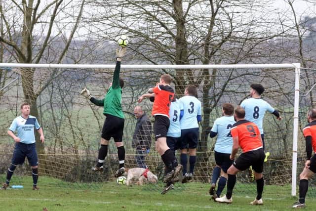 Goalmouth action in the NFA Junior Cup