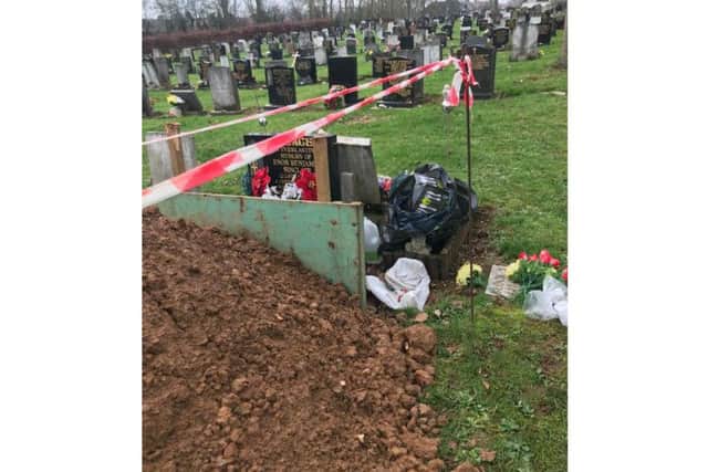 A pile of earth from a nearby plot was dumped on top of Marcia Sinclair's father's grave