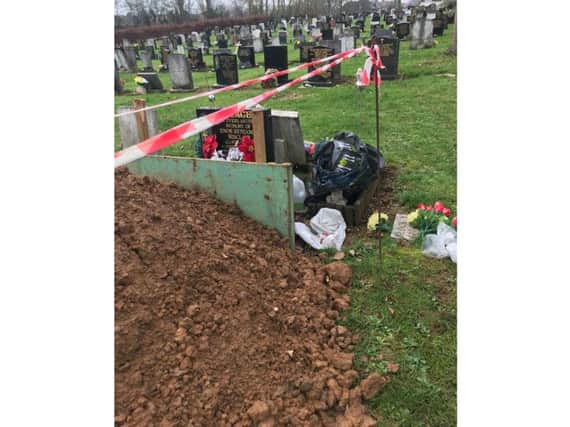 A pile of earth from a nearby plot was dumped on top of Marcia Sinclair's father's grave