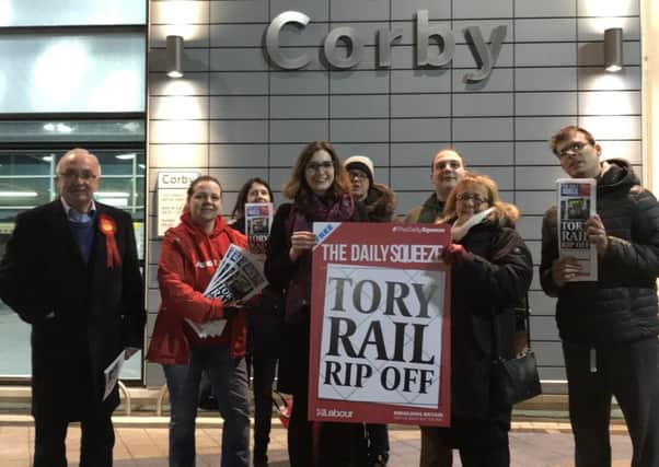 Beth Miller, Labour's Prospective Parliamentary Candidate for Corby and East Northants, with fellow campaigners at Corby Rail Station. NNL-190801-115502005
