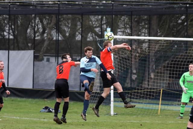 Action from the NFA Junior Cup quarter-final between Kettering Nomads and Rushden & Higham United. Picture by Alison Bagley