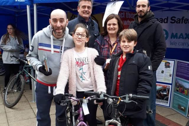 Michael Bell, Alexis Smith, Corby Town Shopping & Willow Place Centre Director Dan Pickard, Maggie Mackay (Home-Start), Josh Smith and Paul Young (Home-Start Dad). NNL-191101-155811005