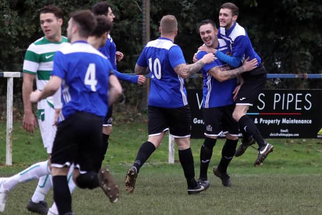 Thrapston Town celebrate their goal during the 3-1 home defeat to Lutterworth Athletic at Chancery Lane. Pictures by Alison Bagley