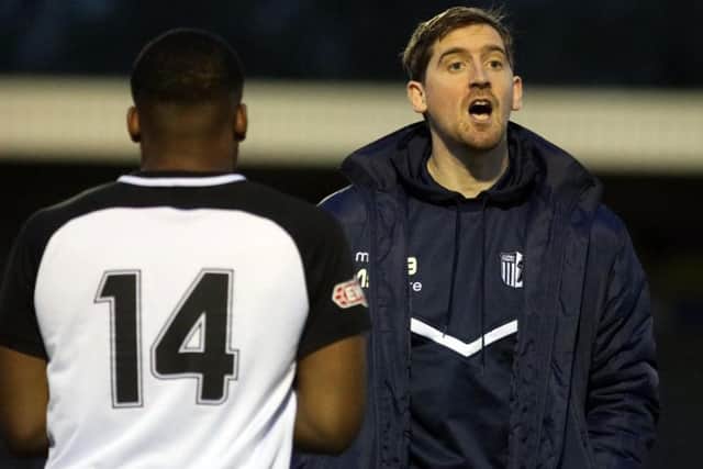Corby Town boss Steve Kinniburgh was pleased to see his team's battling qualities on full show in the 4-4 draw at Sutton Coldfield Town
