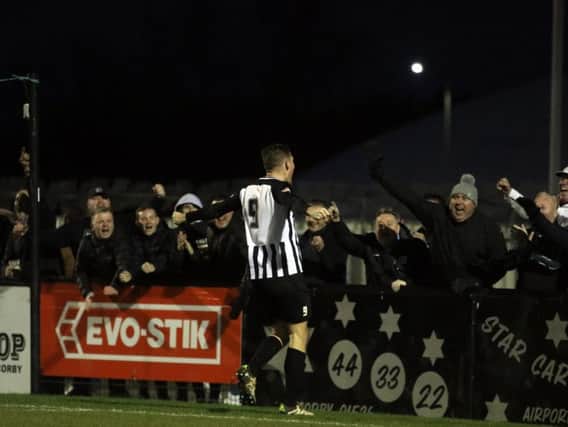 Elliot Sandy has hit 23 goals in all competitions for Corby Town this season and is now top of the goalscoring charts in the Evo-Stik League South Division One Central