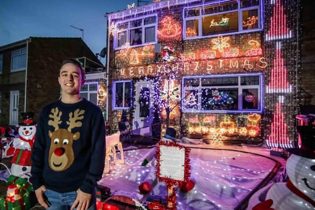 Every year Karl Beetson - pictured here in 2014 - decorates his house and since 2007 has raised 24,000 pounds for charity through donations since 2007