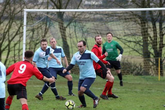 Match action from Kettering Nomads' clash with Sileby Rangers