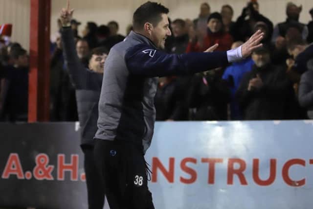 Marcus Law enjoys the celebrations after the final whistle at Stourbridge