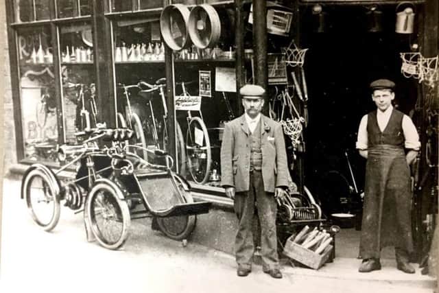 John Rowlatt Senior pictured in 1900 with an early motorised quadricycle