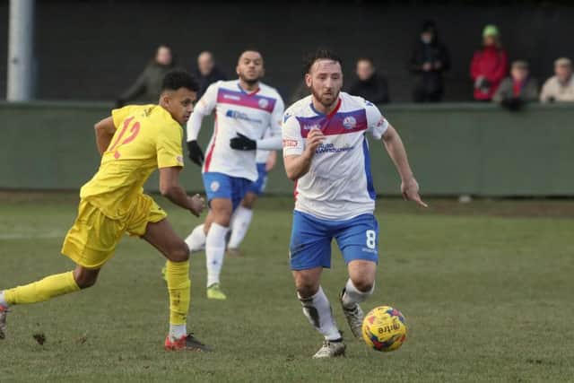 Joe Curtis, pictured in action during last weekends 1-1 draw with Banbury United, is hoping to keep his place in the AFC Rushden & Diamonds team after starting the last two matches. Picture by Alison Bagley