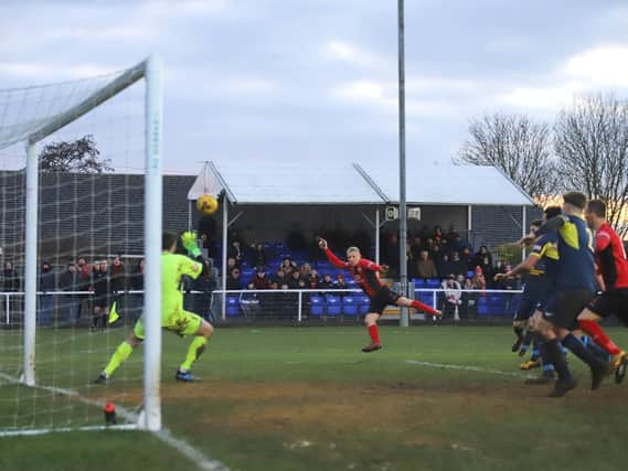 Lindon Meikle fires home the dramatic late winner as Kettering Town beat Needham Market 3-2 at Latimer Park. Pictures by Peter Short