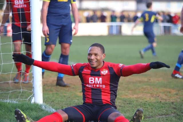 Aaron O'Connor is all smiles after he scored the first of his two goals in the Poppies' win over Needham Market