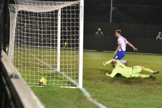 Tom Lorraine scores his second goal on his way to a first-half hat-trick in AFC Rushden & Diamonds 6-0 win over Cogenhoe United, which secured a place in this seasons NFA Hillier Senior Cup final. Picture courtesy of HawkinsImages