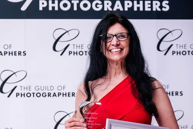 Deanne with her award.