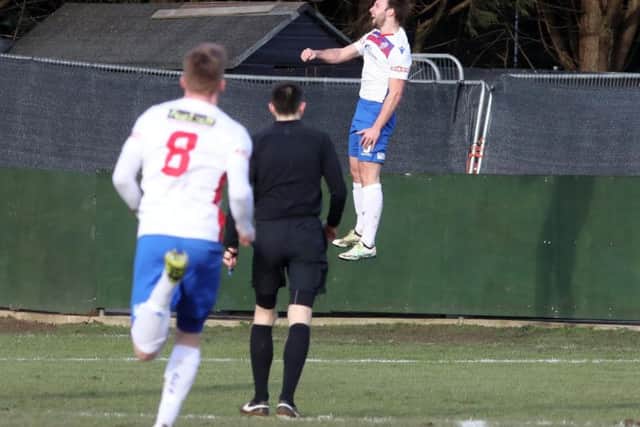 Tom Lorraine jumps for joy after scoring the only goal in AFC Rushden & Diamonds' fine win over King's Lynn Town. Pictures by Alison Bagley