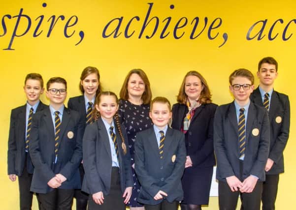 Sarah Wilson, Executive Principal at CMAT (centre left), and Angela Smith, Headteacher at The Ferrers School (centre right), with students from the Ferrers School. NNL-191002-190858005
