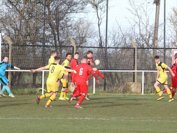 Goalmouth action from Irchester United's 4-0 victory over Raunds Town in Division One of the United Counties League. Pictures by Alison Bagley