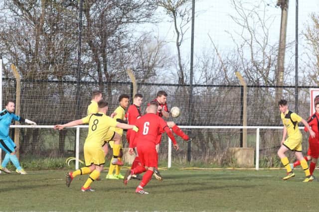 Goalmouth action from Irchester United's 4-0 victory over Raunds Town in Division One of the United Counties League. Pictures by Alison Bagley