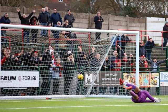 The ball is in the net after Dan Holman scored Kettering Town's third goal in last weekend's 4-1 success at Redditch United. Pictures by Peter Short