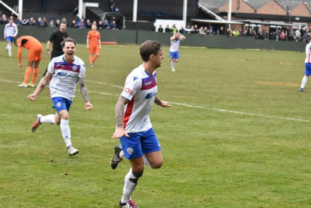 Jack Ashton heads off to celebrate his goal in AFC Rushden & Diamonds' 1-1 draw with Leiston at Hayden Road. Picture courtesy of HawkinsImages