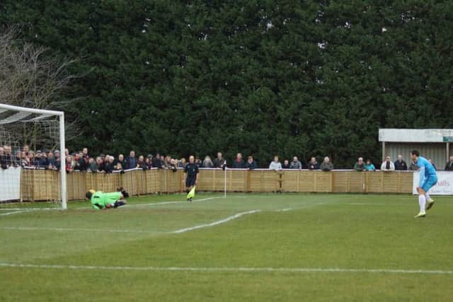 Dan Holman sees his second-half penalty saved by St Ives goalkeeper Martin Conway