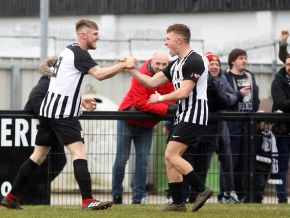 Connor Kennedy and Jordon Crawford celebrate the former's goal, which proved to be the winner as Corby Town beat Didcot Town 3-2 at Steel Park. Pictures by Alison Bagley