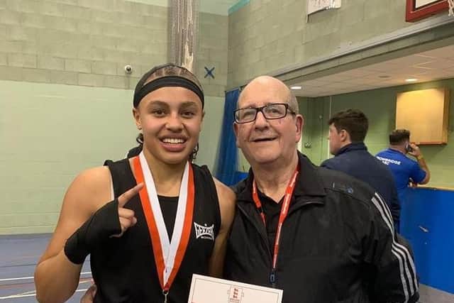 Loleta Spencer and her coach Ray Revell enjoy the moment after she became national champion