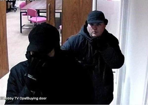The image released by police showing two men wanted in connection with a burglary in Oundle NNL-190221-103442005