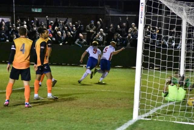 AFC Rushden & Diamonds captain Liam Dolman heads off to celebrate after he opened the scoring in the 2-0 victory over Stratford Town. Picture courtesy of HawkinsImages