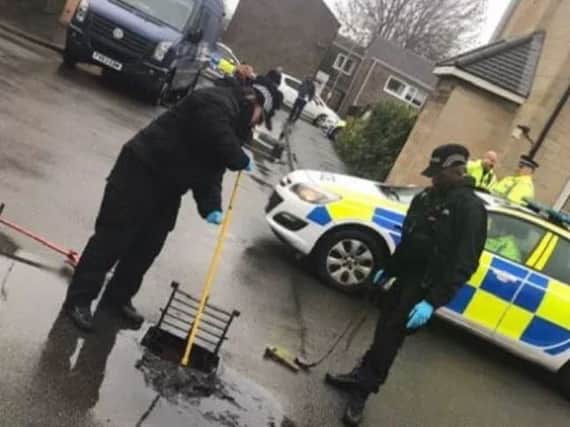 A drain is searched following the shooting over Christmas NNL-190221-140655005