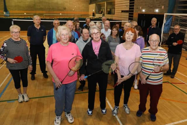 Members of the Kettering Over 50s Activities Group with founder Beryl Goodall (front left) who are celebrating their 20th anniversary today. NNL-190221-213216005