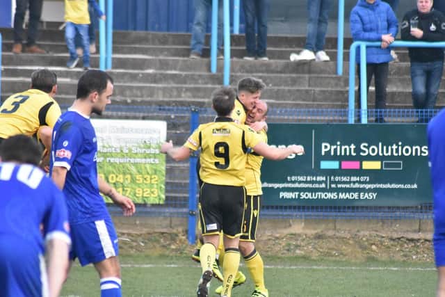 Ben Diamond gets a lift from Liam Dolman after he scored the only goal of the game to give AFC Rushden & Diamonds a victory at Halesowen Town. Picture courtesy of HawkinsImages