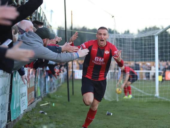 Brett Solkhon's face tells the story after he grabbed Kettering Town's stoppage-time winner against Rushall Olympic at Latimer Park. Pictures by Peter Short