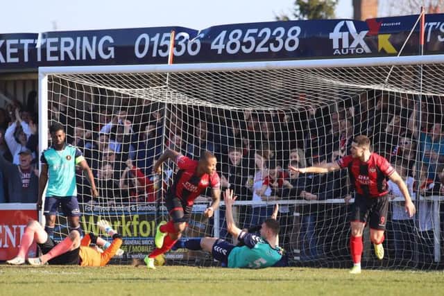 Aaron O'Connor heads off to celebrate after he gave the Poppies an early lead