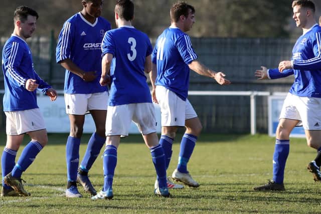 Rothwell Corinthians celebrate one of their goals during the 4-0 victory at Whitworth in the United Counties League Premier Division. Pictures by Alison Bagley