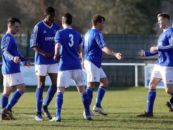Rothwell Corinthians celebrate one of their goals during the 4-0 victory at Whitworth in the United Counties League Premier Division. Pictures by Alison Bagley