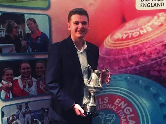 Kieran Rollings shows off the trophy after he was named Bowls Englands Young Male Bowler of the Year