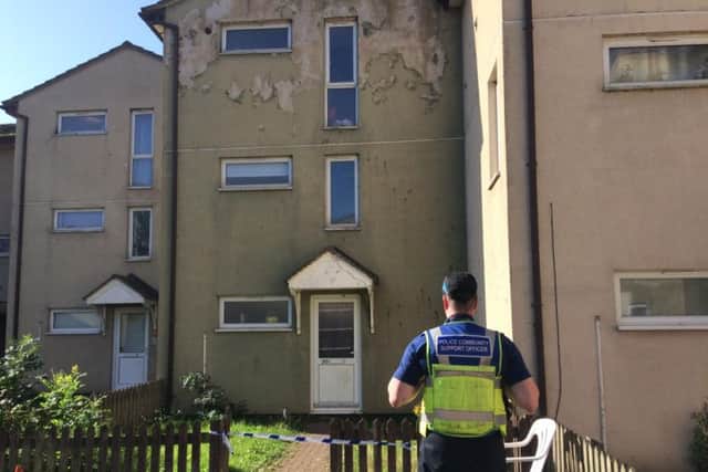 The run-down three-storey house in Butterwick Walk, Corby, where Thomas Gravestock was killed last August