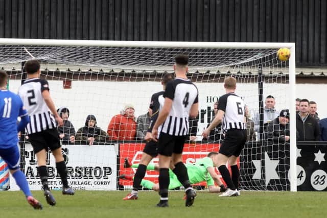 Dan George makes a good save in the first half at Steel Park