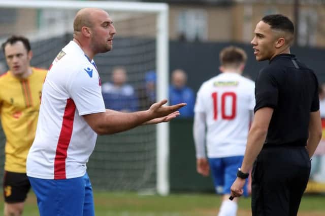 AFC Rushden & Diamonds captain Liam Dolman has a disagreement with the referee during the 1-1 draw with Alvechurch at Hayden Road. Pictures by Alison Bagley