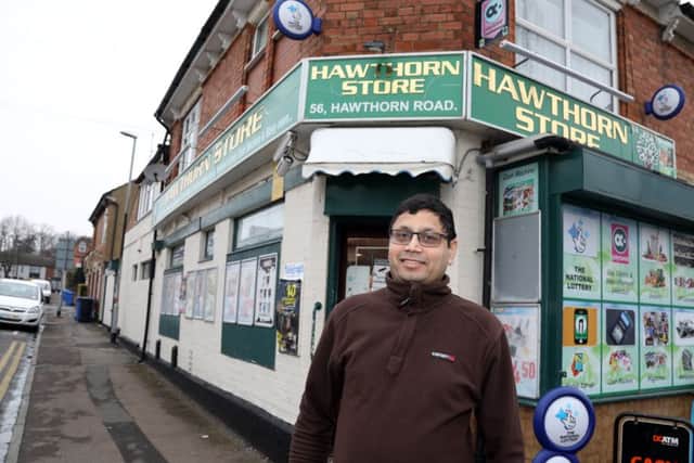 Shop owner Dilip Patel says the permits won't guarantee people a space.
