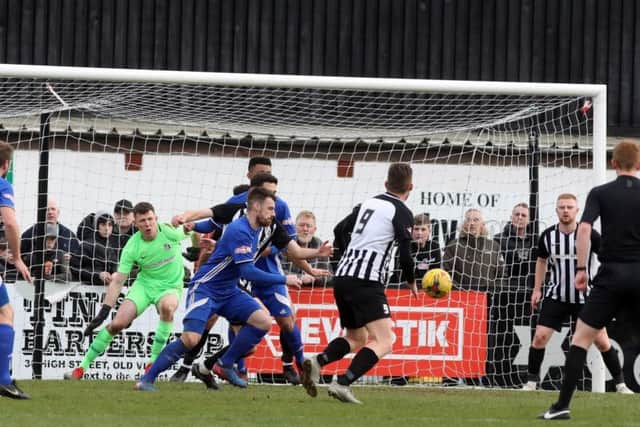 Goalmouth action from Corby Town's 3-1 home defeat to Peterborough Sports. Pictures by Alison Bagley