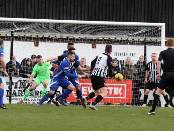 Goalmouth action from Corby Town's 3-1 home defeat to Peterborough Sports. Pictures by Alison Bagley