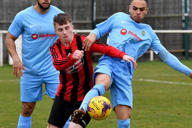 Action from the United Counties League Premier Division clash between Whitworth and Rugby Town. Picture by Martin Pulley