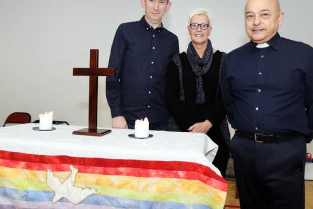 Vicar Melvyn Pereria with Paul McSharry and empowerment worker Jayne Jones.