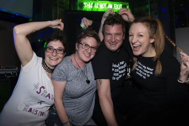 L-R Bethany Harris, Michelle Ryan, Tim O'Neill and Katie O'Neill each had their heads shaved to raise money and awareness for ovarian cancer. Picture: Kirsty Edmonds.