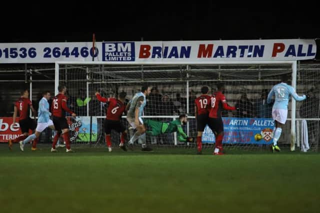 Kyle Perry's stoppage-time header sent Kettering Town to defeat as Coalville Town claimed a 3-2 success at Latimer Park. Pictures by Peter Short