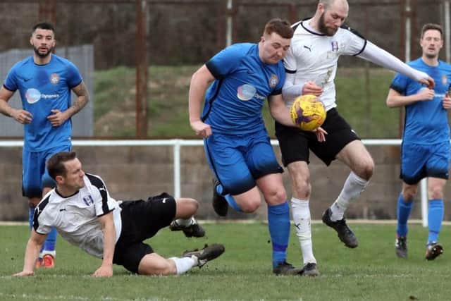 Match action from the clash between Desborough Town and Daventry Town