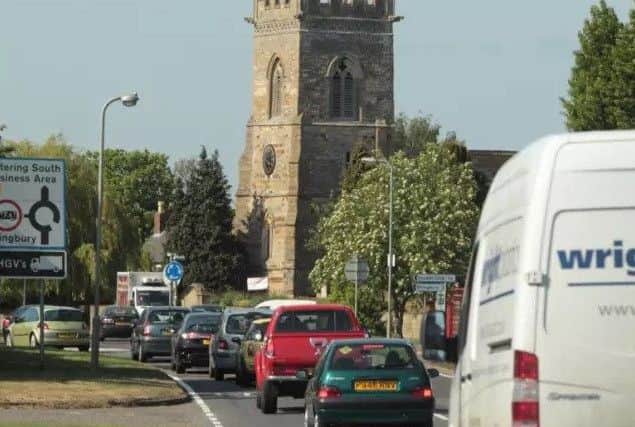 Traffic in Isham backs up at peak times.